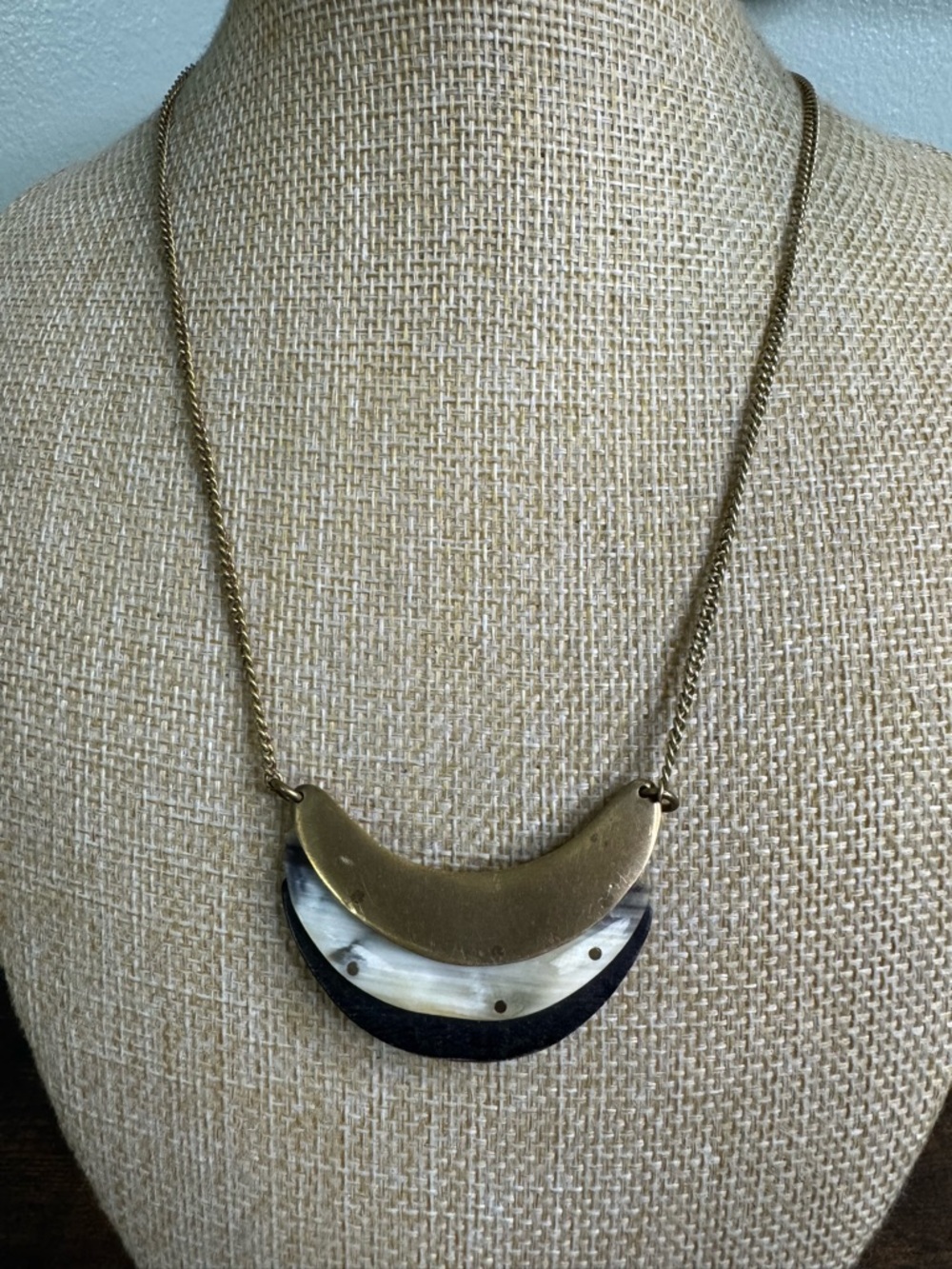 Hand Crafted Brass Crescent Necklace with Cream and Black Accents